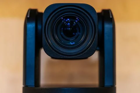 High-definition camera lens mounted on a black robotic gimbal, showcasing i.. Stock Photos