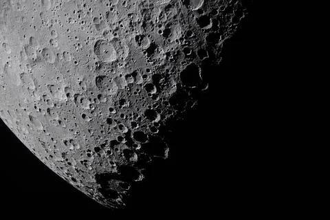 High definition close-up of the Moon terminator line with dramatic shadows .. Illustrazione stock