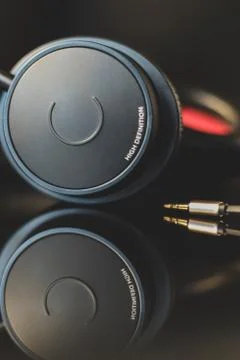 High definition earphone with nice reflection in focus. Stock Photos