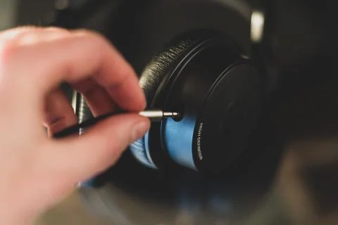 High definition earphone with nice reflection in focus. Stock Photos