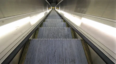 High definition movie of moving escalator going down closeup 1080p Stock Footage
