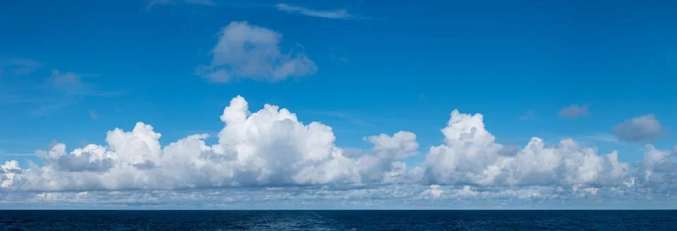 High definition panoramic cloudscape over ocean Stock Photos