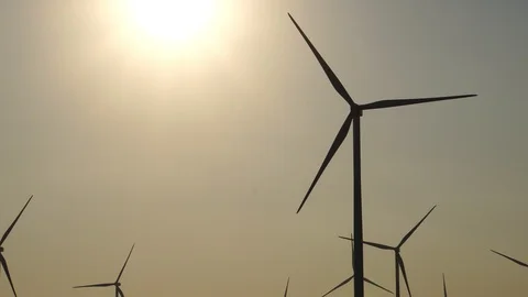 High definition sequence of wind generators during the sunset  Stock Footage 121237893