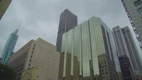 High-density and multi-textured high-rise buildings on a cloudy day Stock Footage 154294199