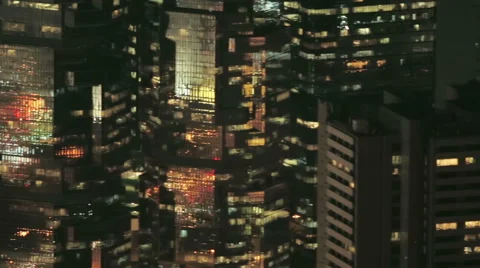 High density architecture - pan across skyscraper windows at night, Hong Kong Stock Footage 57104863