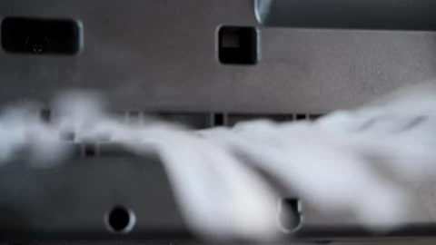 High detail view of a shredding machine cutting a sheet of paper. Stock Footage 304366368