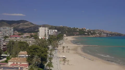 High drone flight along the beach promenade of a mediteranean resort Stock-Footage 150339687