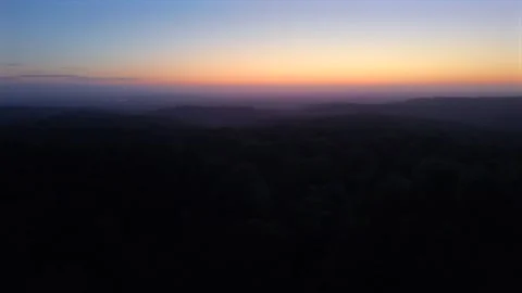 High drone flight at sunrise over Cannock Chase in Staffordshire Stock Footage 339659754