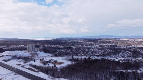 High drone panorama over snowy residential city district Stock Footage 328962994