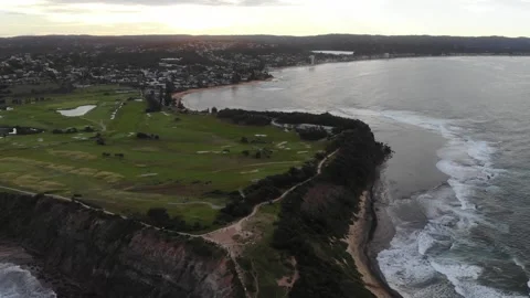 A high drone video of a mountain and a beach Stock Footage 135646901