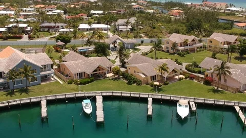 High Drone View of Bahamia Canal, Luxury Homes and Condos, Grand Bahama Stock Footage 89392175