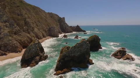 High drone view of beach near Lisbon, Portugal. Vehicle tracks drawn in the sand Stock Footage 324817336