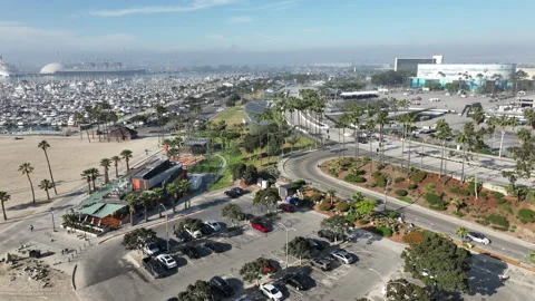 High drone view of Long Beach marina with workers and equipment preparing for a Stock Footage 333769191
