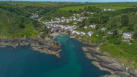 High Drone View of Polperro Harbour and Coastal Village Cornwall Stock Photos