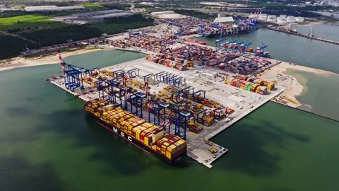 High Drone View Shows Gdansk Port As Cloud Shadow Moves Across Polish Logistics Stock Footage 323277598