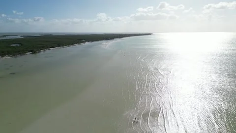 High Drone View of a Wide Clean Sandy Bay With Hills  Vídeos de archivo 321419424