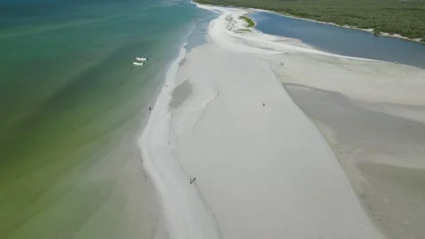High Drone View of a Wide Clean Sandy Bay With Hills Stock Footage 321419461