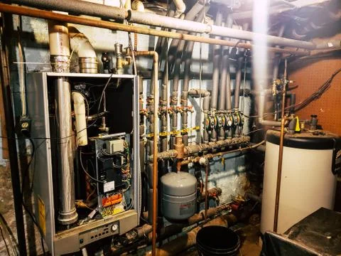 High Efficiency wall mounted gas boiler with multiple zone valves Stock-Fotos
