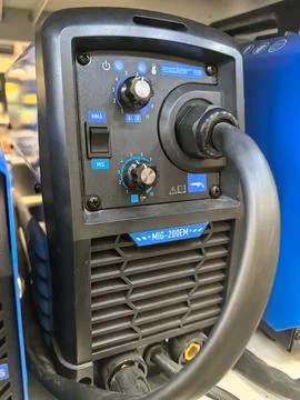 High-efficiency welding machine ready for metalwork projects at workshop Stock Photos