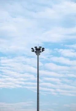 High electric pole and cloud streaky wave on sky Stock Photos