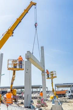High elevated cherry picker with people who are working in heavy duty Stock Photos