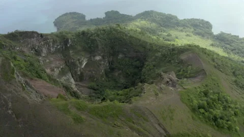 High Elevation Aerial: Overgrown Volcanic Crater With Steep Forested Slopes Lead Stock Footage 149307572