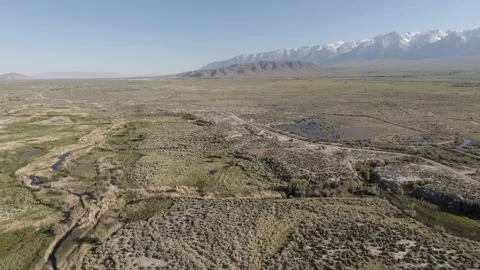 High elevation aerial view of sunny Owens Valley in California Stock Footage 189554181