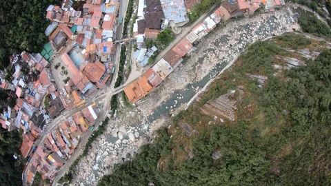 High elevation birds eye view of city next to river Stock Footage 115727151