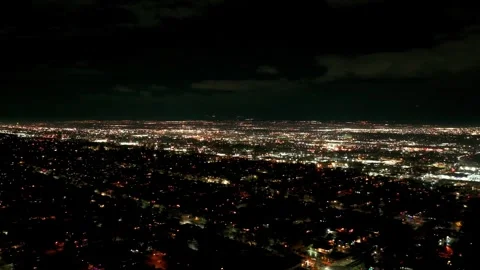 High elevation drone shot of Salt Lake City, Utah suburbs at night Stock Footage 257053610