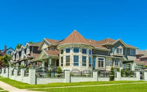 High end custom built luxury house with rotunda in a residential neighborhood. Stock Photos
