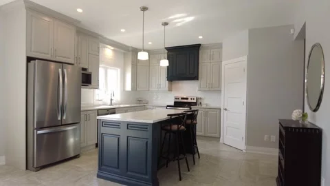 High end kitchen pov gimbal walk closer to look in depth real estate Video stock 153619783