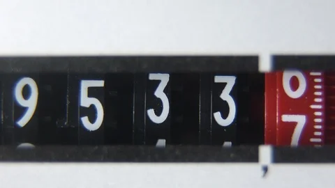 High energy consumption time-lapse. Domestic electricity meter dial close-up. Video stock 100715588
