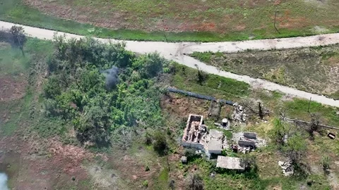 High-Explosive Detonation Near Damaged Rural Building Stockbeeldmateriaal 332354712