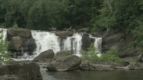  High Falls Waterfall and Large Boulders Stock Footage 77374860