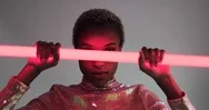 High Fashion Model Posing With Neon Tubes In Studio Stock Footage