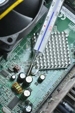 High fever temperature on computer board Stock Photos
