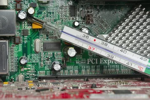 High fever temperature on computer board Stock Photos