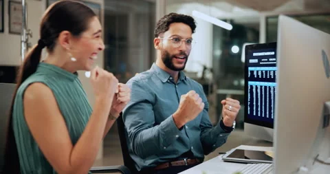 High five, computer screen and business people in office with trading win 스톡 동영상 336309081