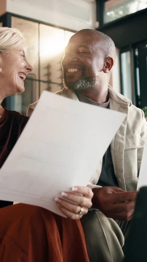 High five, document and interracial couple with home finance, mortgage approval Stock Footage 338054561