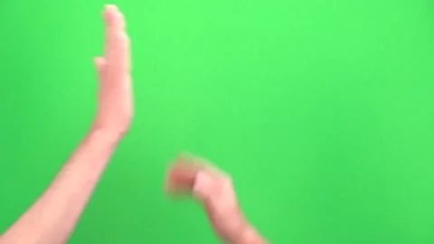 High five! Greetings from a man's hand on a green background or chromakey Stock Footage 140748541