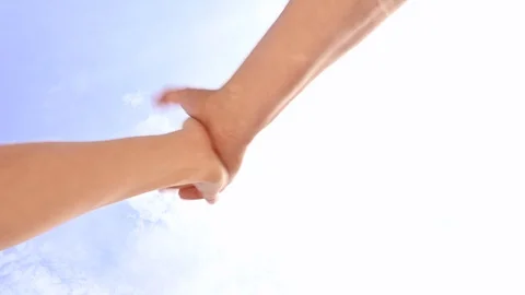 High five handshake, closeup two hands takes each other sky background Stock Footage 107680284