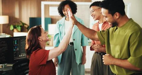 High five, programmer and team with business people in office for app devel.. 스톡 사진