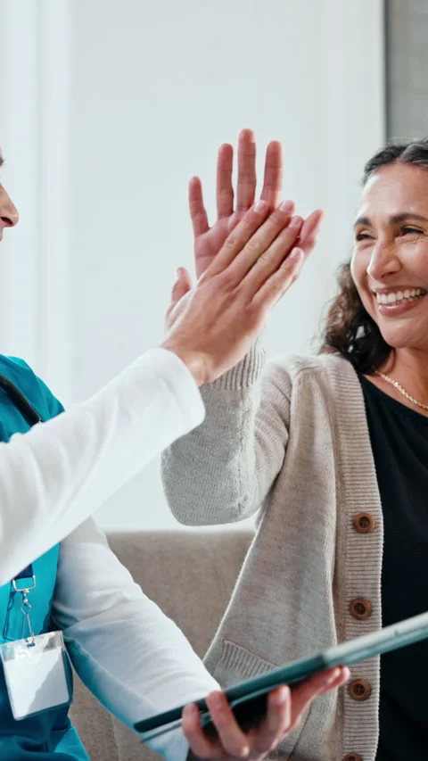 High five, tablet and doctor with patient for online results, diagnosis or check Stock Footage 341477475