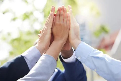High five, team building or hands of business people outside in collaboration Fotos de archivo