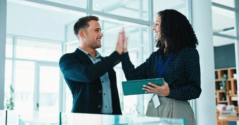 High five, teamwork and business people in office with achievement, goal or good Stock Photos