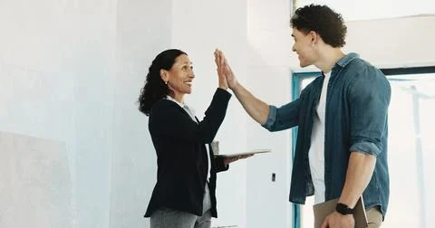 High five, technology and inspection team on site for building, maintenance or Stock Photos