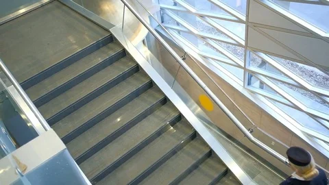 High flight attendant, shod in high heels, climbs up the ladder Stock Footage 71634815