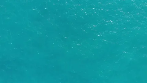 High flight over the calm turquoise sea surface on a sunny day. Stock Footage 140218596