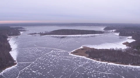High flight over frozen lake Stock Footage 123770783