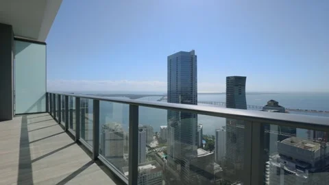 High floor view from open terrace with concrete tiles floor on skyscrapers built Stock Footage 280444746